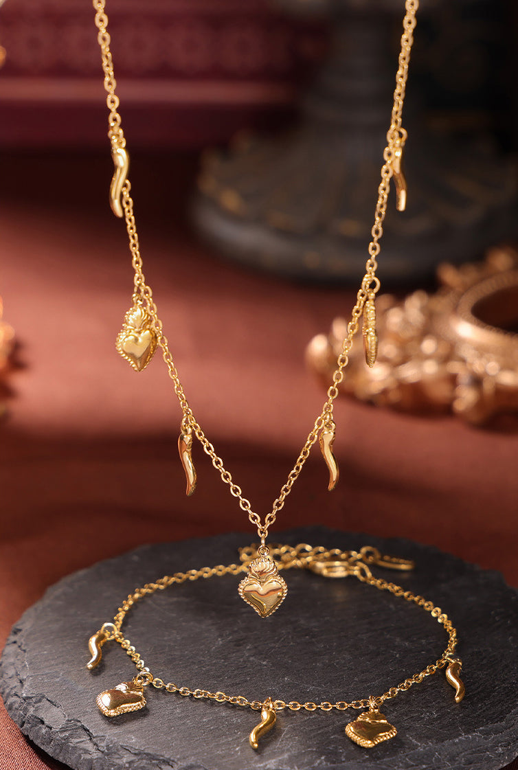 Conjunto de pulsera y collar con colgante de corazón de acero inoxidable