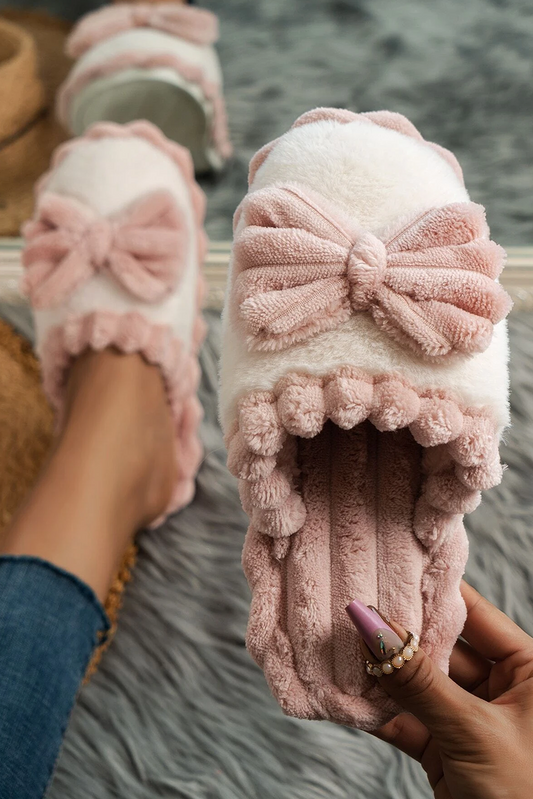 Pantuflas de invierno de felpa con lazo fucsia