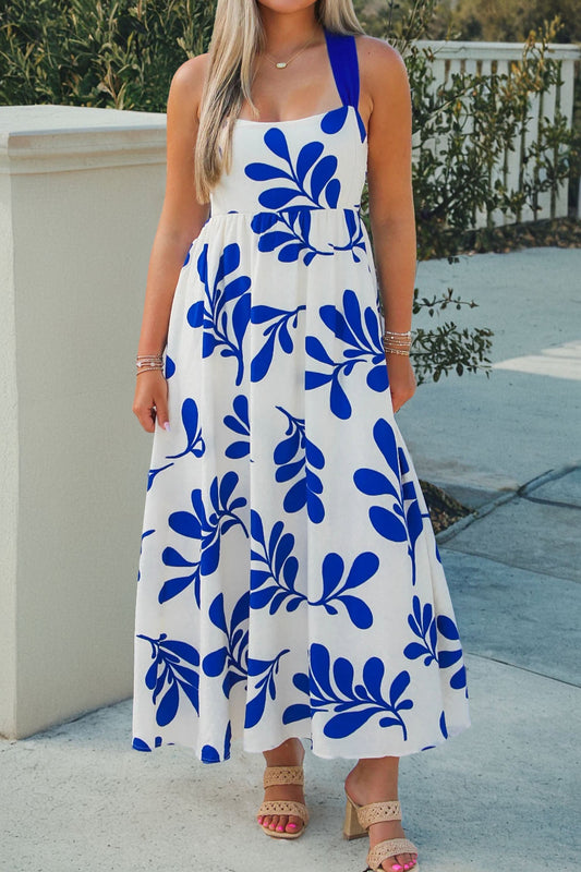 Vestido largo sin mangas con estampado floral azul y espalda cruzada anudada