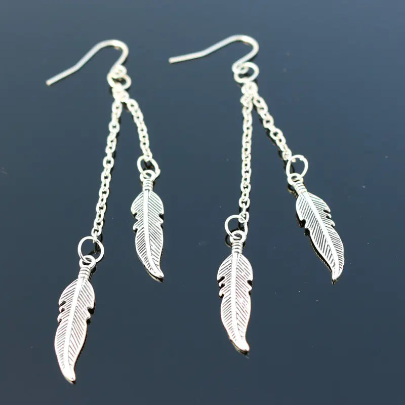 Pendientes de hoja de moda con borla de cadena y plumas