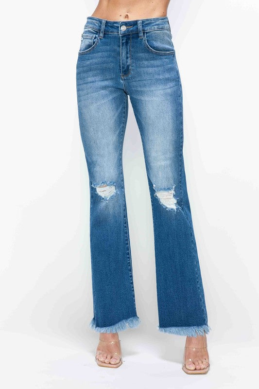 bytos Jeans acampanados de tiro alto rotos con bajo sin rematar