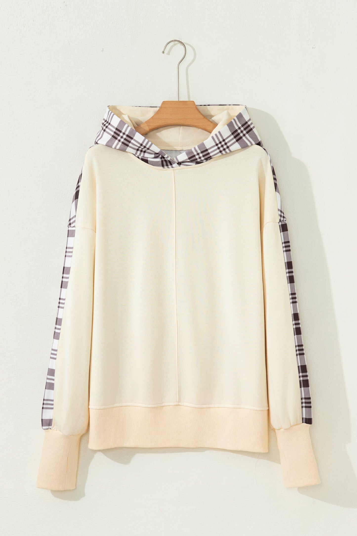 Sudadera con abertura lateral y retales de cuadros beige
