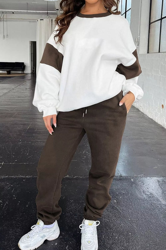 Conjunto de sudadera holgada con hombros caídos y joggers deportivo