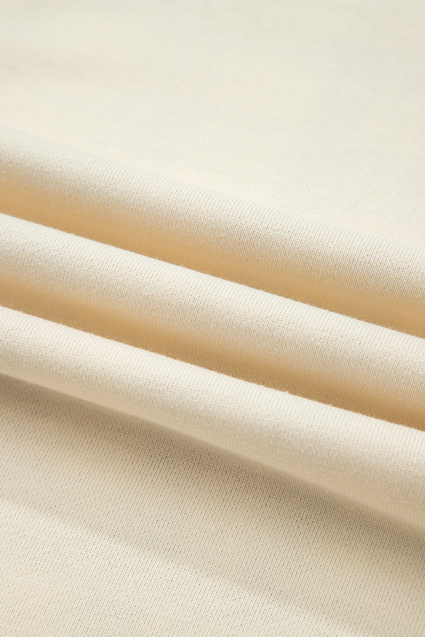 Sudadera con abertura lateral y retales de cuadros beige