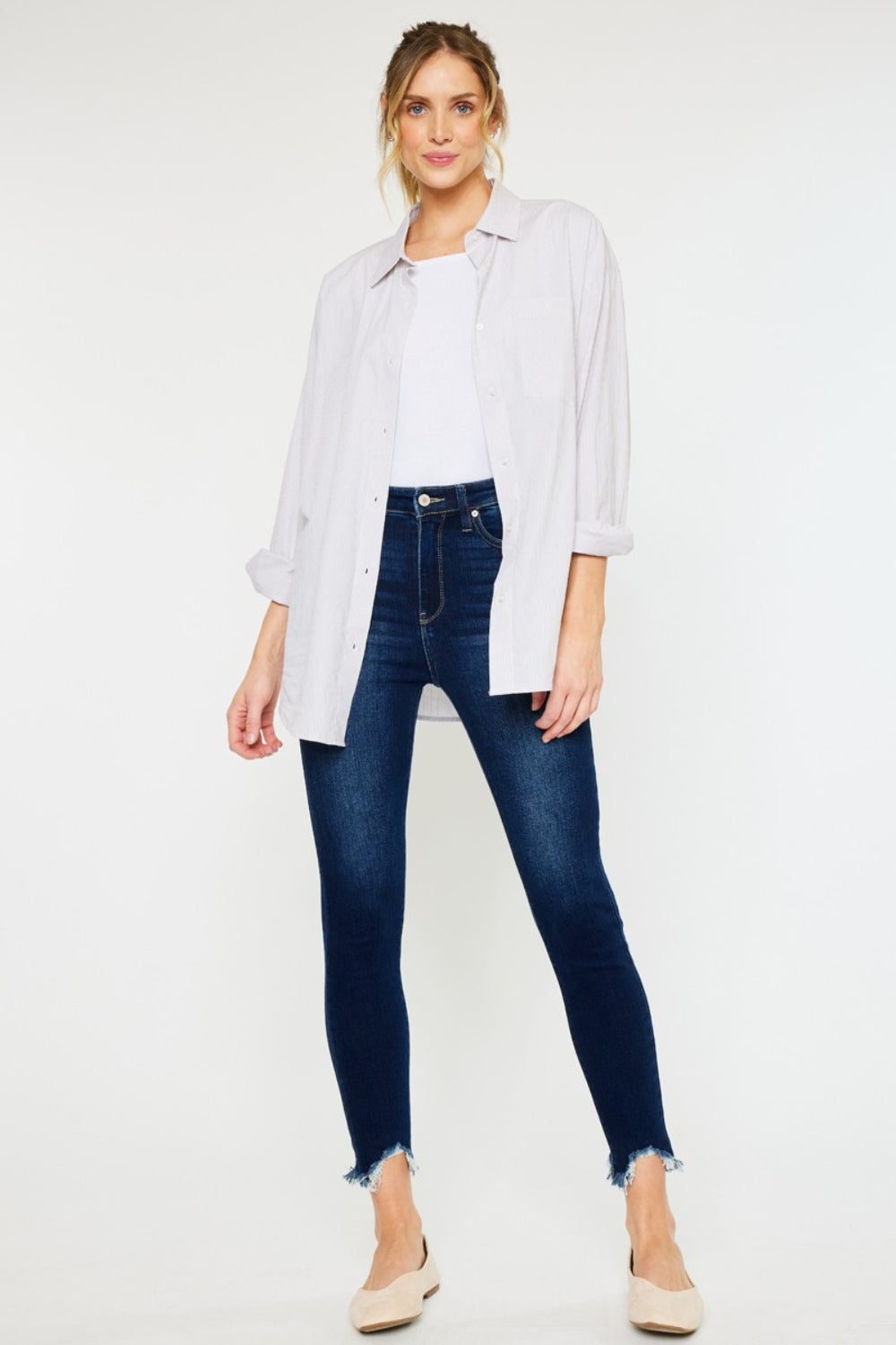 Jeans ajustados Kancan de tiro alto con dobladillo deshilachado hasta el tobillo, talla completa