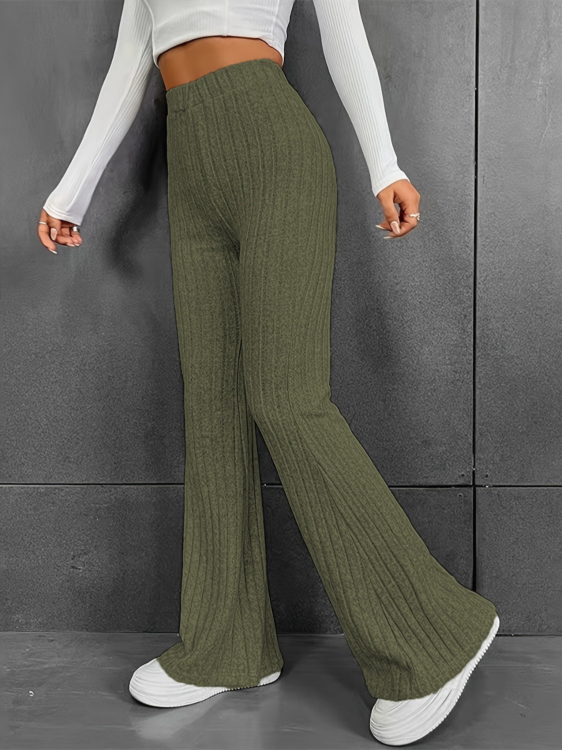 Pantalones acanalados de cintura alta con corte de bota