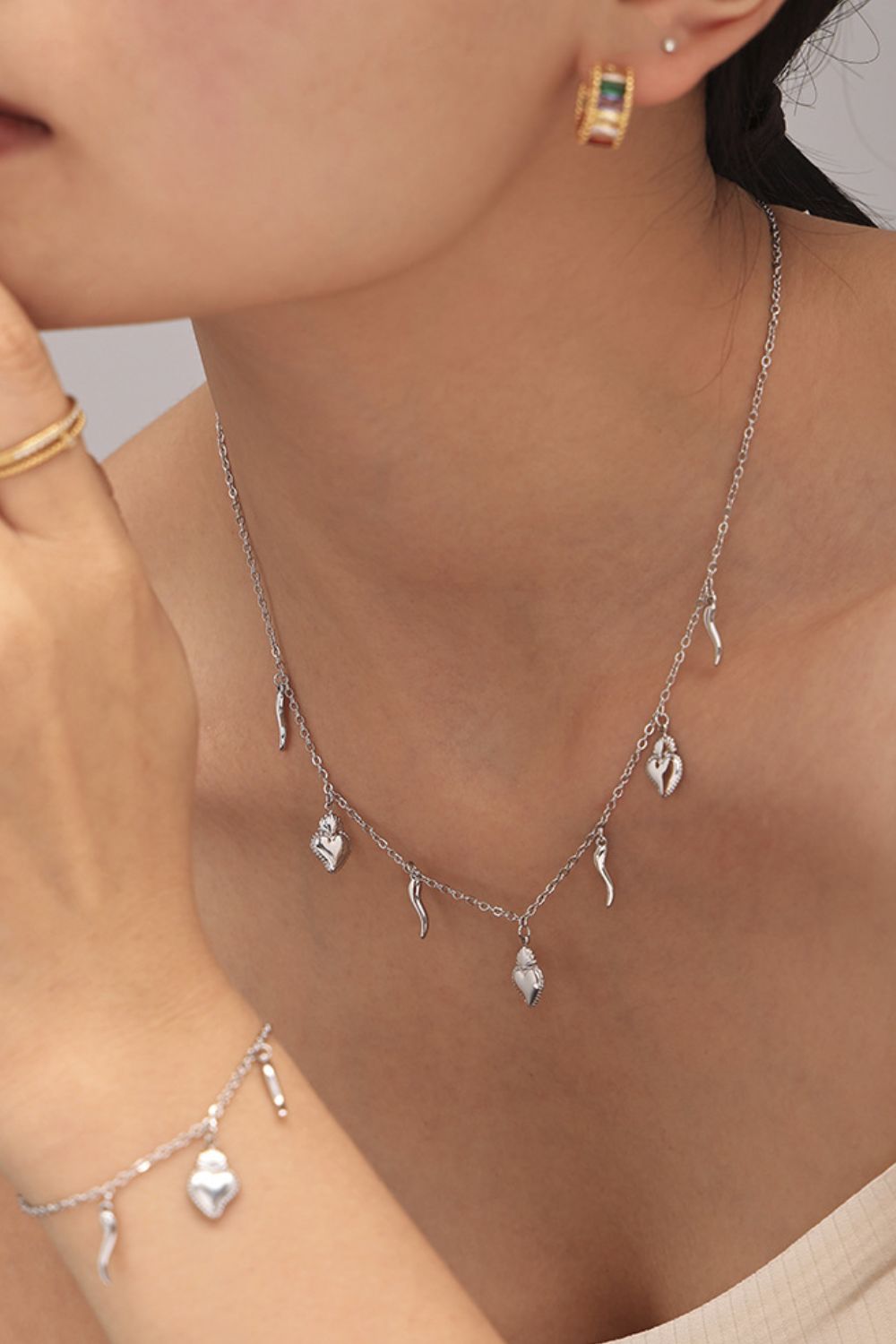 Conjunto de pulsera y collar con colgante de corazón de acero inoxidable