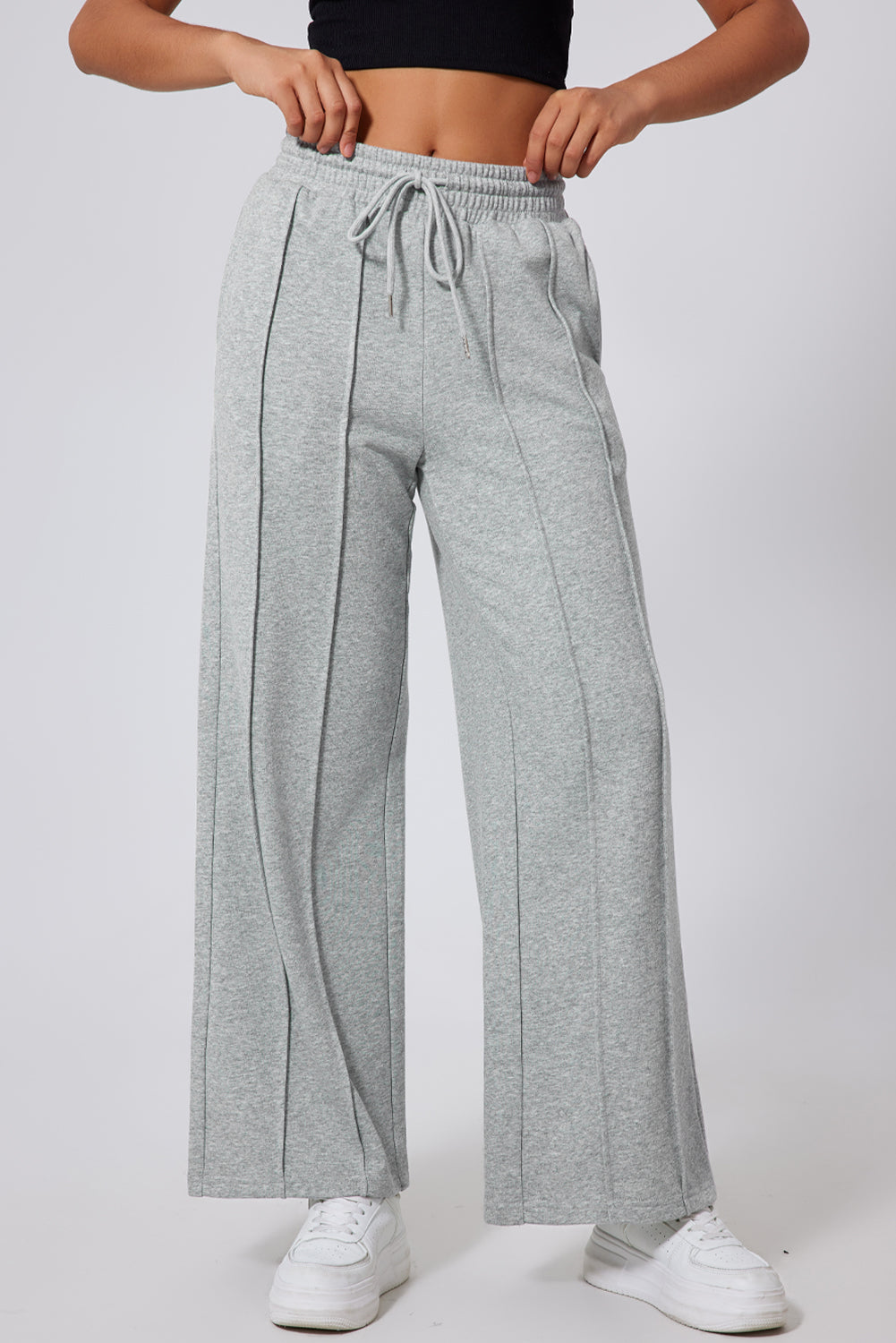 Pantalón de chándal gris de pernera ancha, talle alto, con cordón y costuras