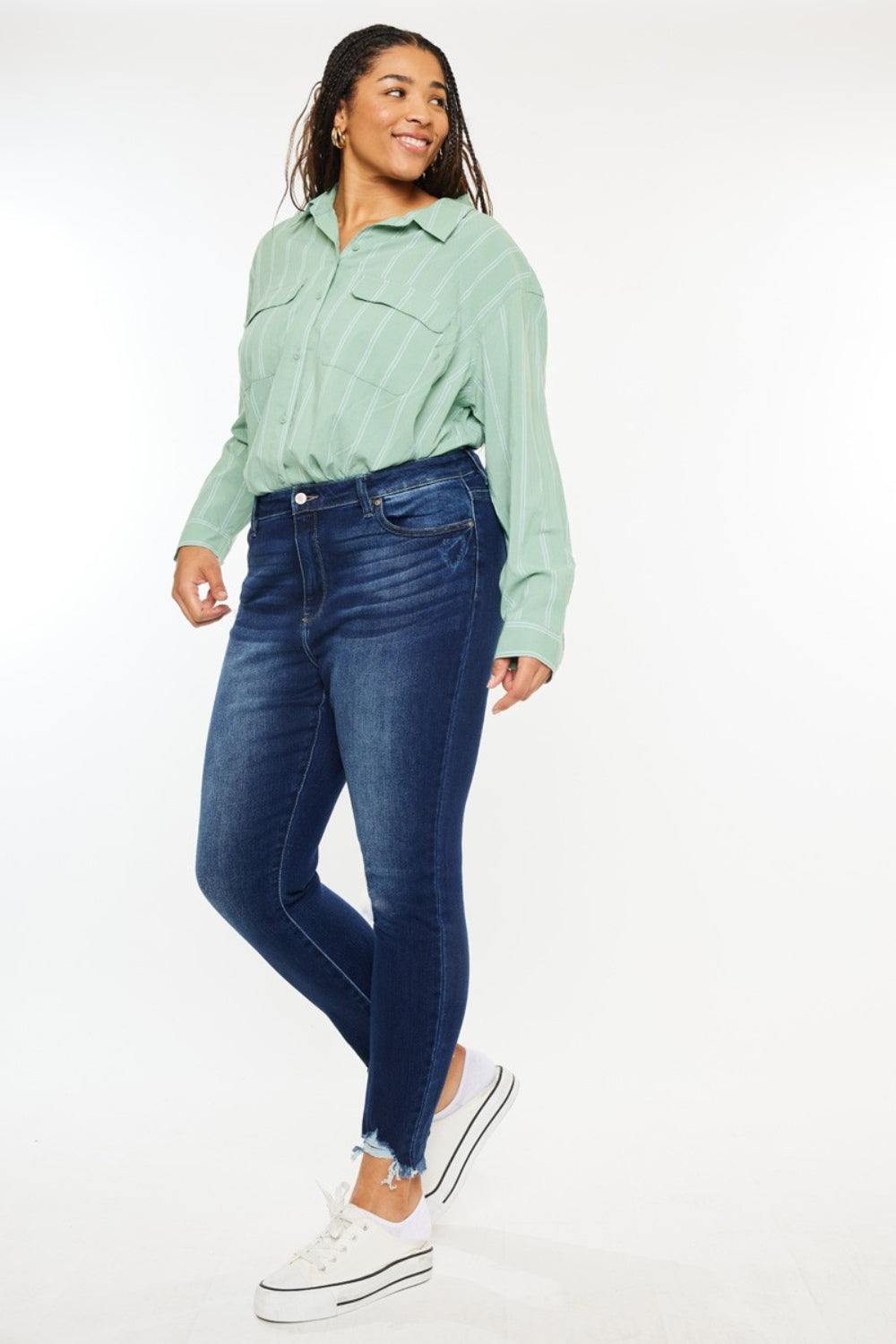 Jeans ajustados Kancan de tiro alto con dobladillo deshilachado hasta el tobillo, talla completa