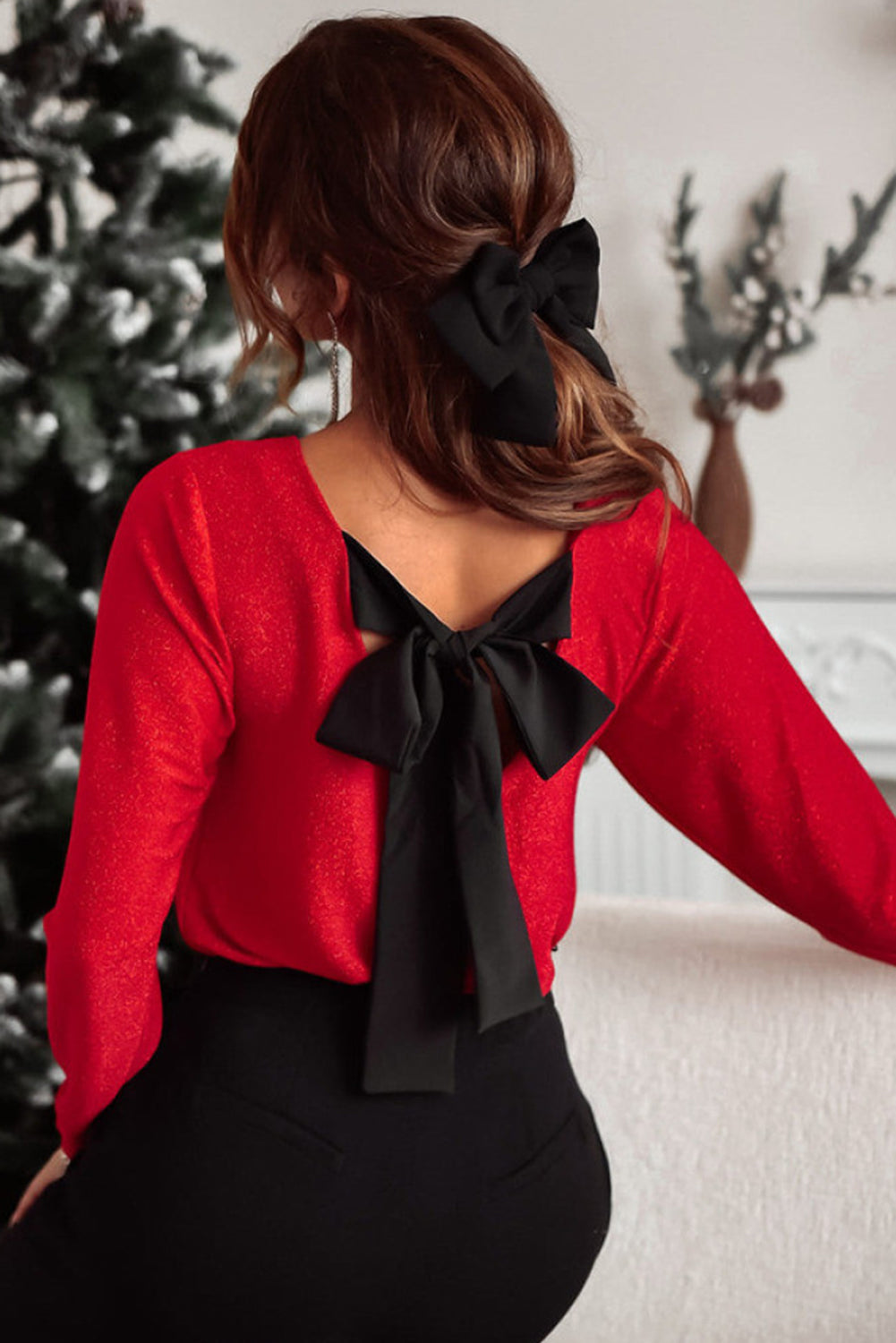 Blusa de manga larga con lazo y cuello en V