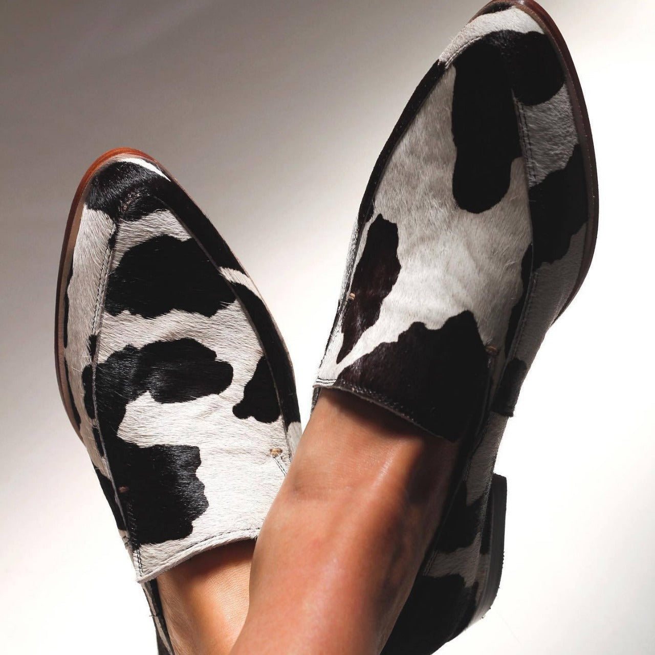Women's Pointed-Toe Cow Print Flats
