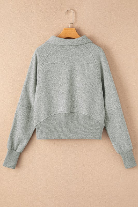 Sudadera de cuello medio con cremallera y forro polar liso