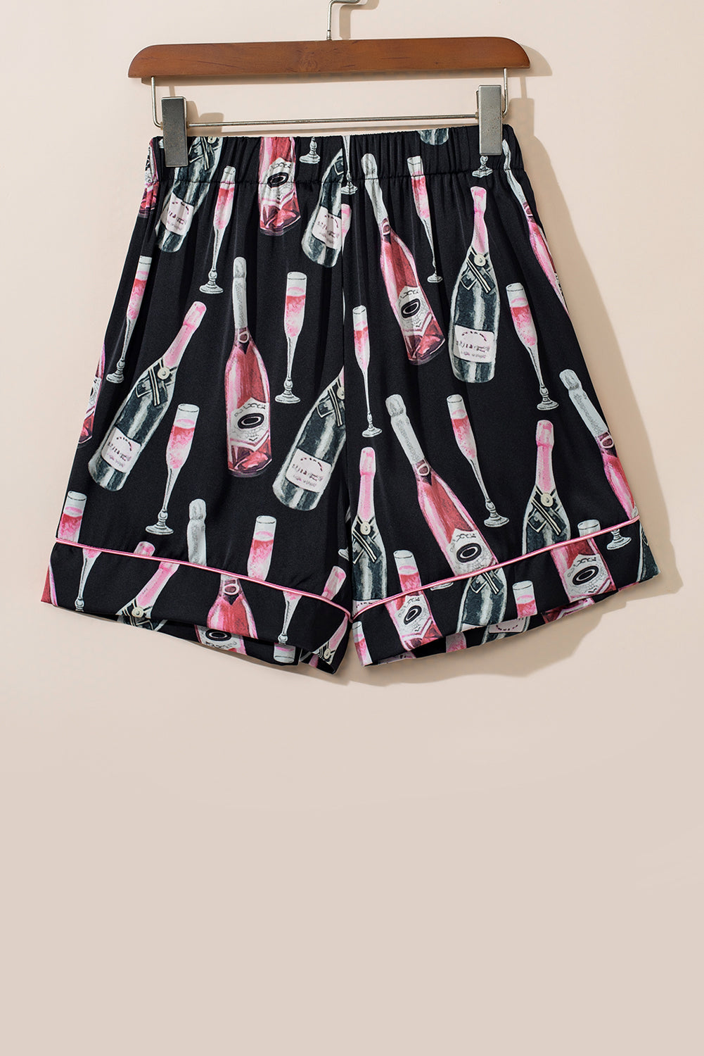 Conjunto de top de manga corta y shorts con estampado de champán