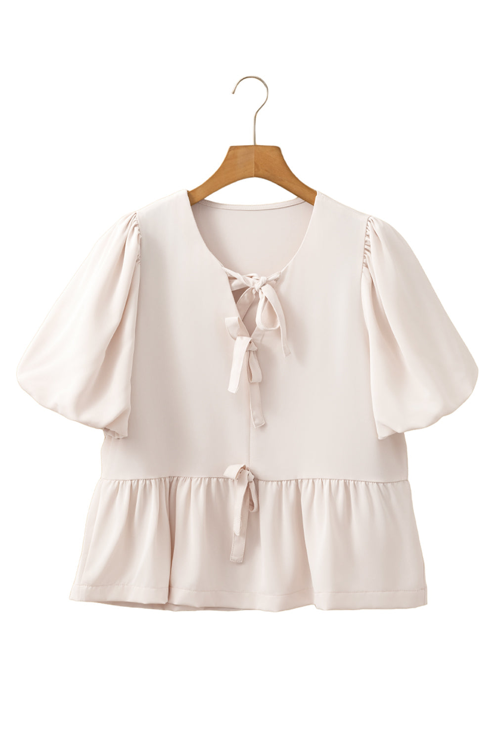 Blusa peplum blanca con lazo y mangas abullonadas