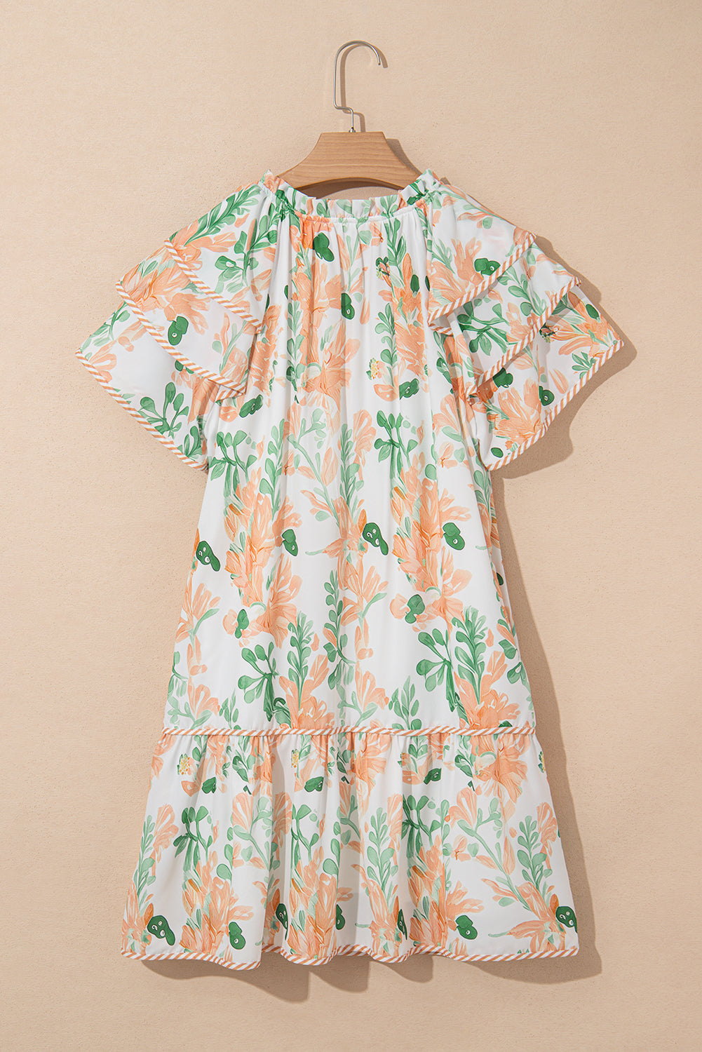 Minivestido con cuello anudado, manga con volantes en el borde en contraste y estampado floral azul cielo