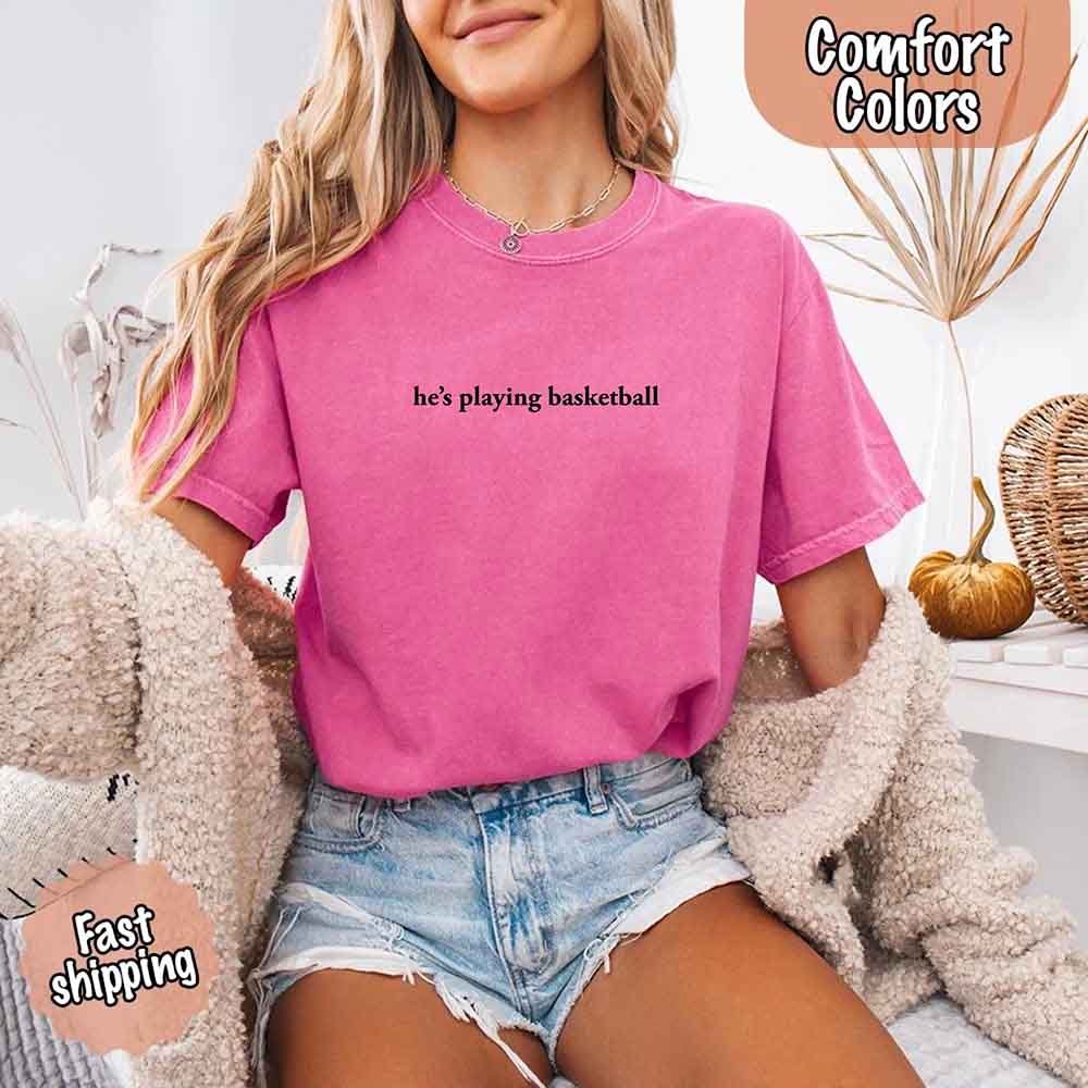 He’s Playing Basketball – Funny Sports Girlfriend Comfort Colors Shirt for Women
