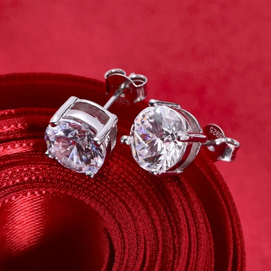 Round Four-Prong Moissanite Stud Earrings in Sterling Silver