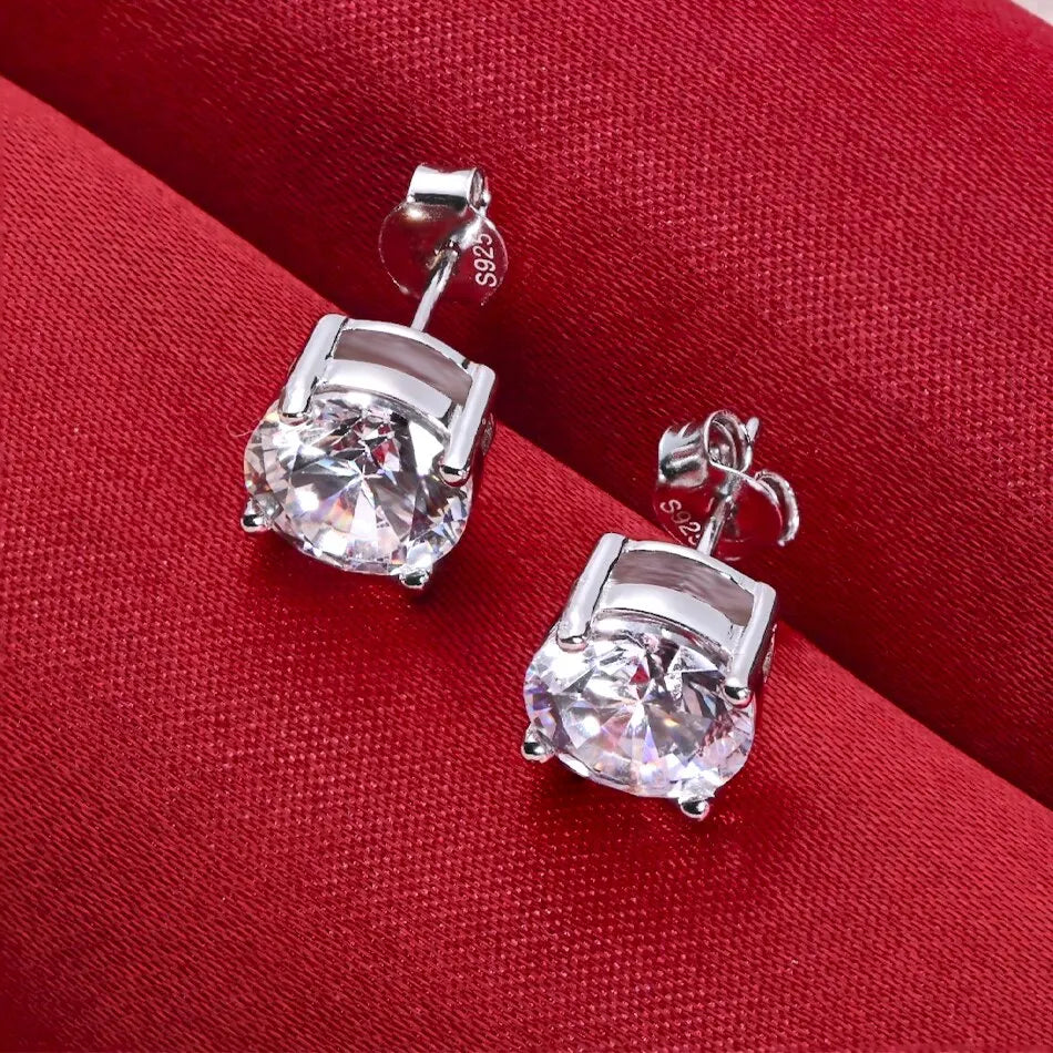 Round Four-Prong Moissanite Stud Earrings in Sterling Silver