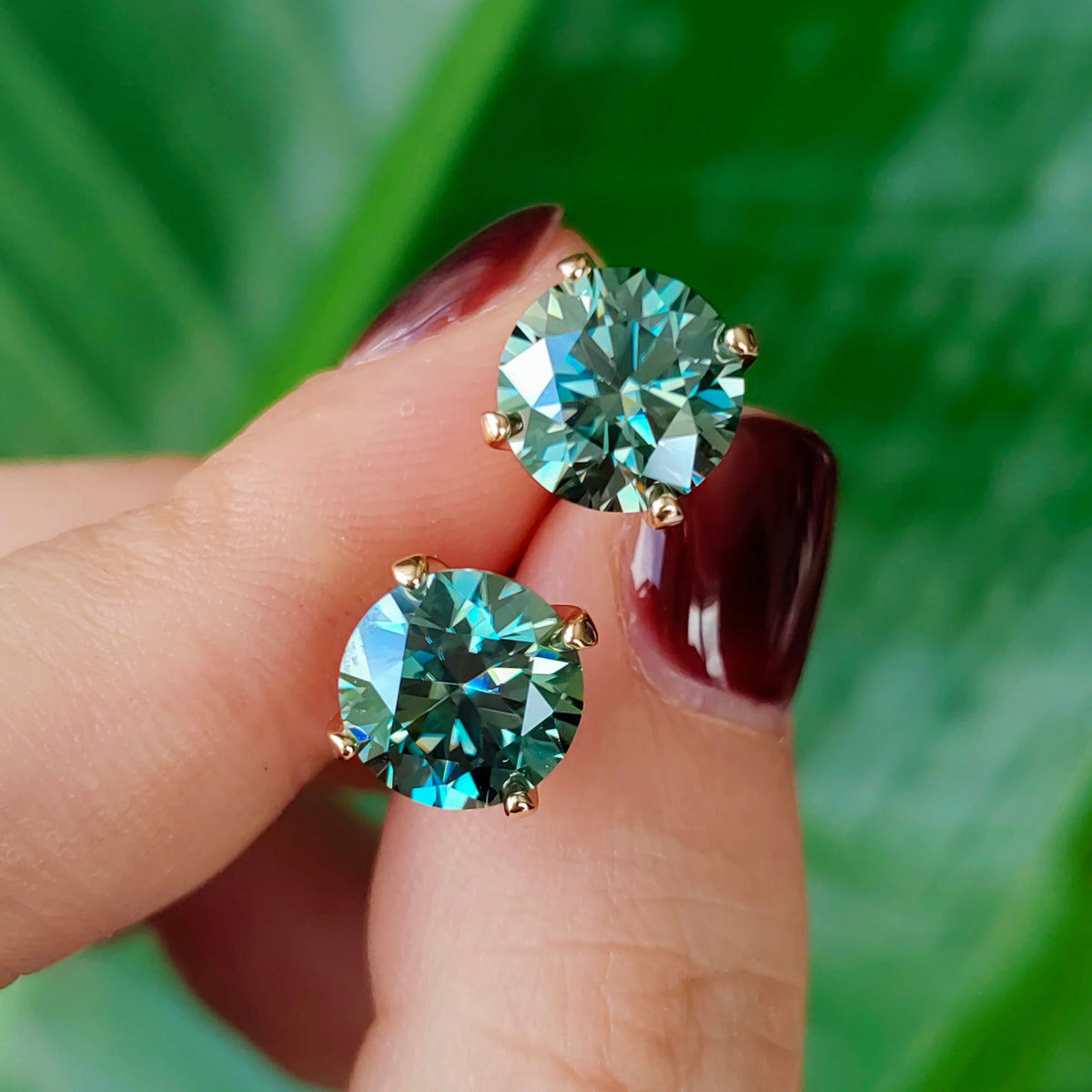 Cyan Round Moissanite Stud Earrings in Sterling Silver