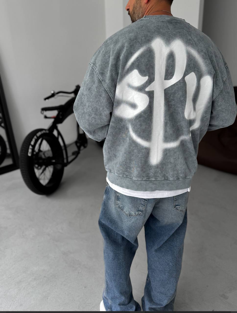 Sudadera extragrande unisex con bolsillo canguro y diseño de grafiti