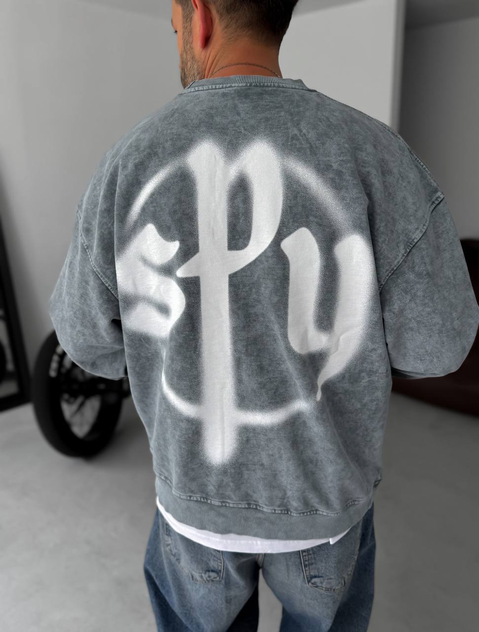 Sudadera extragrande unisex con bolsillo canguro y diseño de grafiti