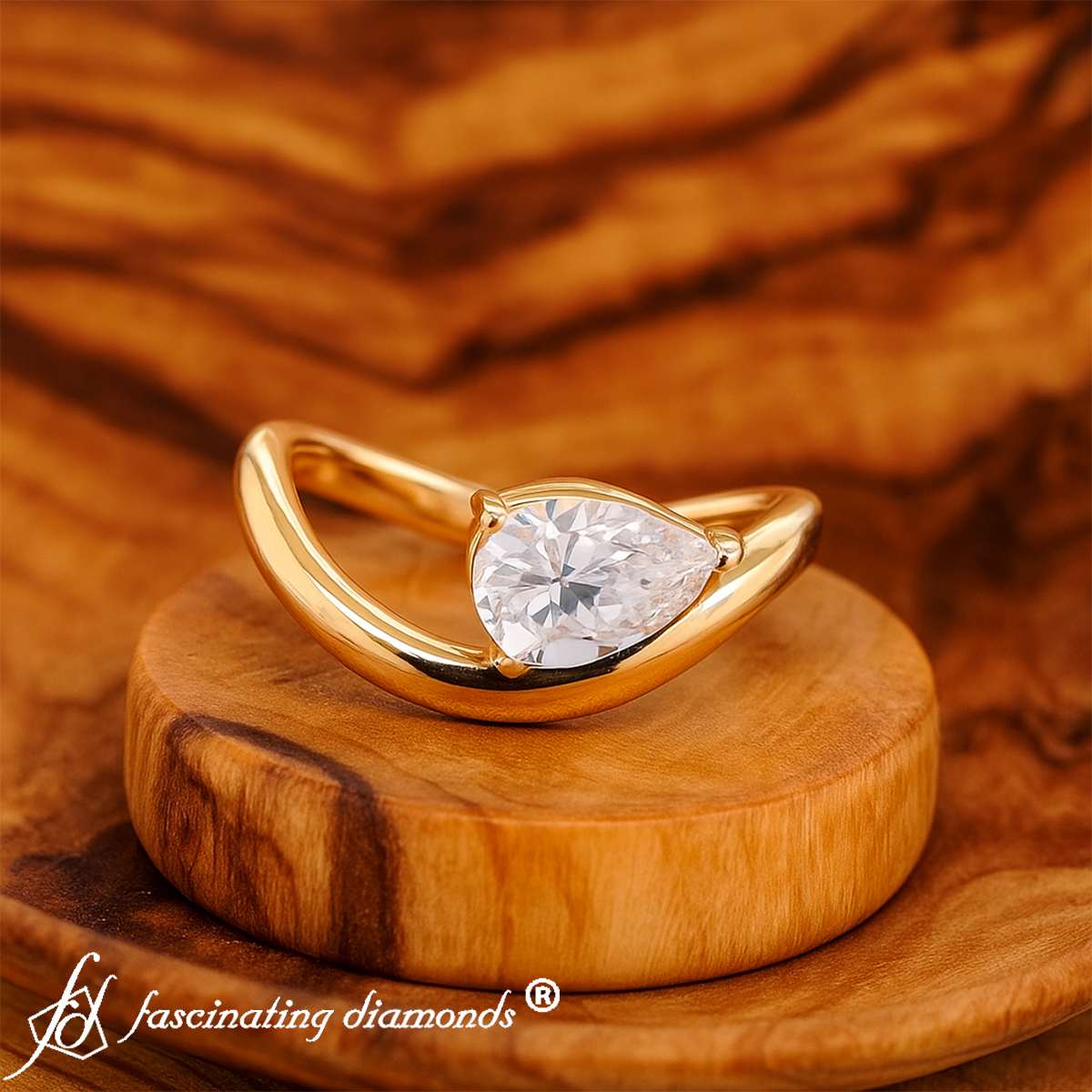 Curve Wave Pear Shaped Solitaire Diamond Ring