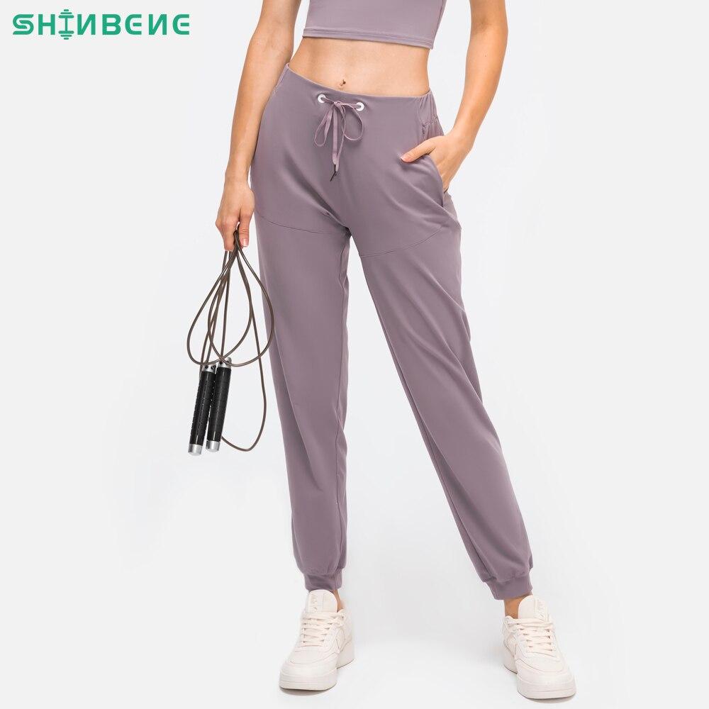 Pantalones deportivos elásticos y cómodos BareMove para mujer, 28"