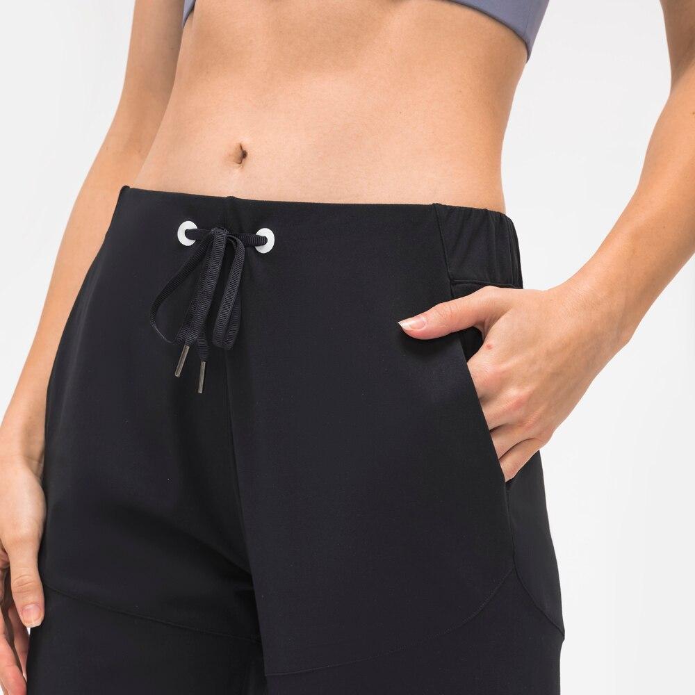 Pantalones deportivos elásticos y cómodos BareMove para mujer, 28"