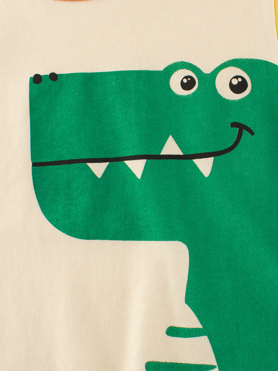 Camiseta de manga corta con estampado de dinosaurio de dibujos animados, retales de colores y estilo europeo y americano para niños