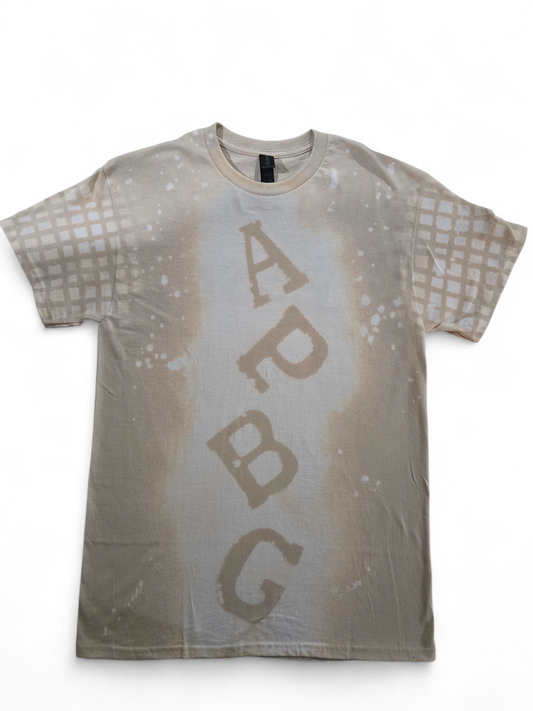 Camiseta APBG/PRESIÓN color crema
